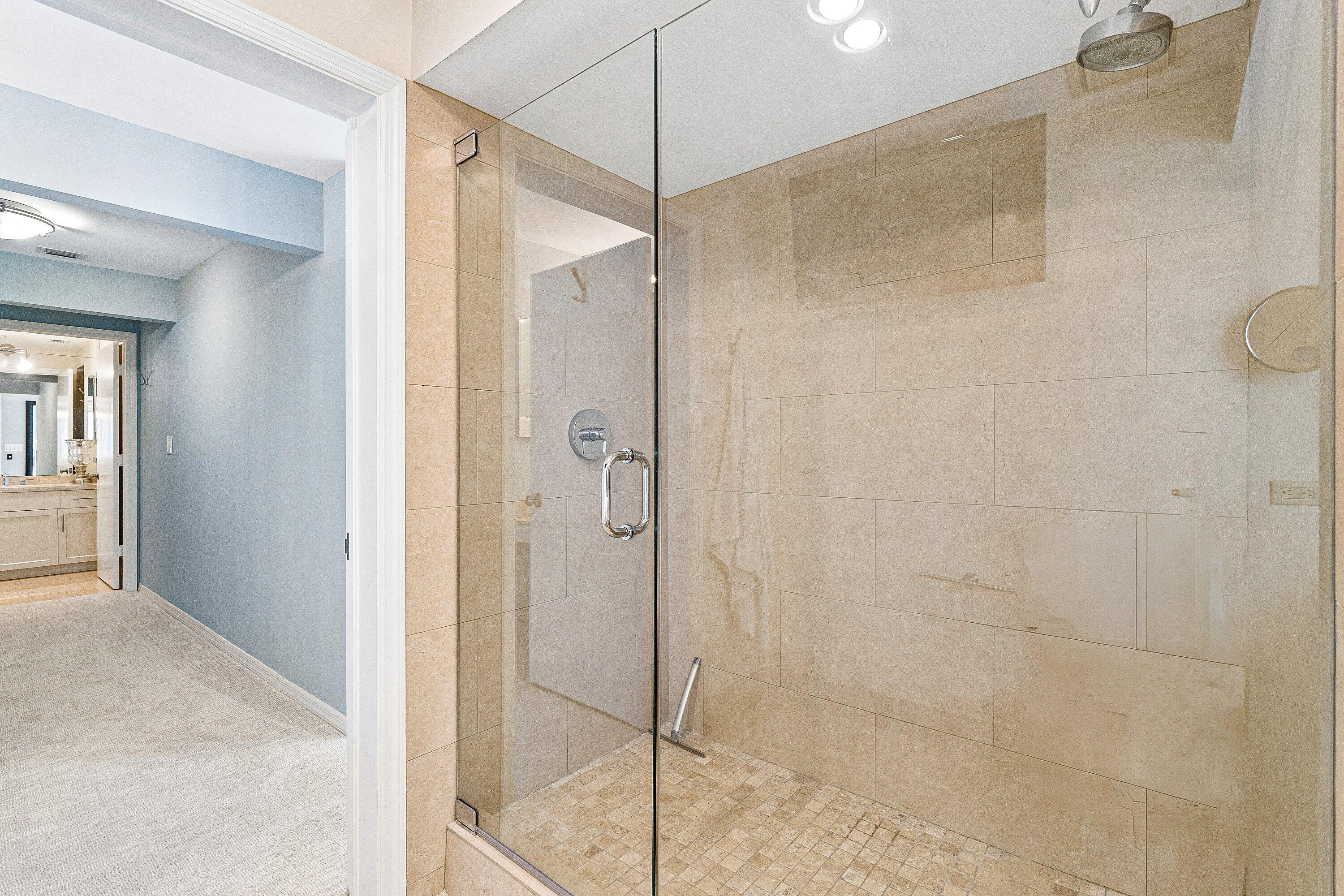 300 Southeast 5th Avenue, Unit PH 8120 Boca Raton, FL 33432 - Photo 19 of 54 a bathroom with a shower