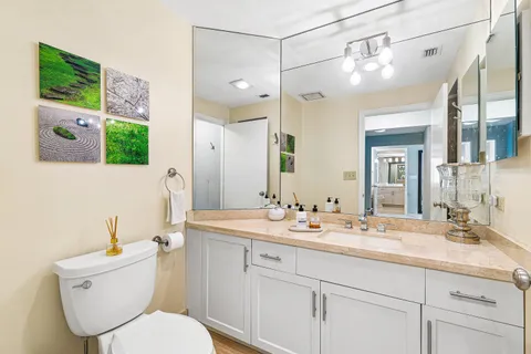 a bathroom with a bathtub and shower