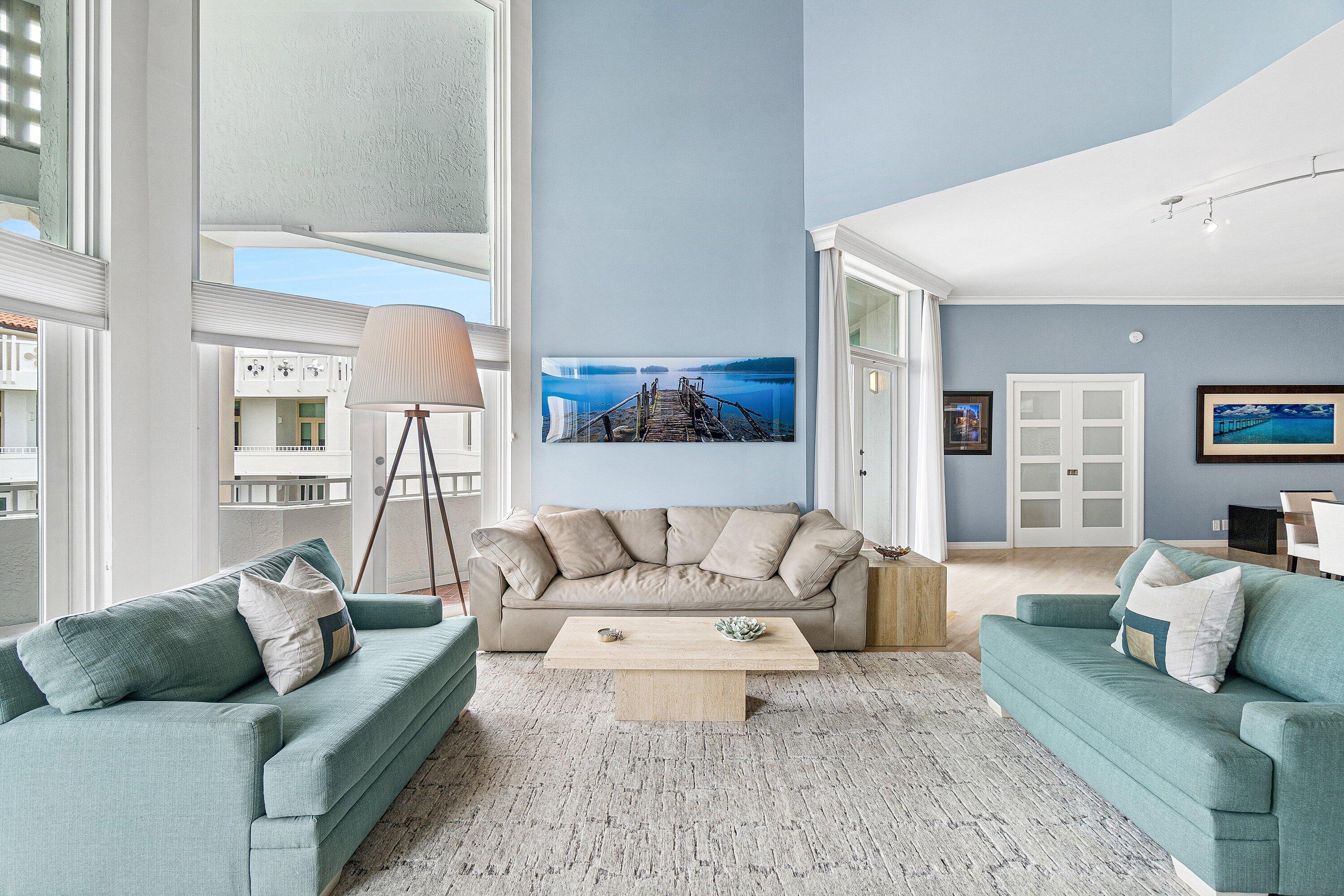 300 Southeast 5th Avenue, Unit PH 8120 Boca Raton, FL 33432 - Photo 3 of 54 a living room with furniture and a large window