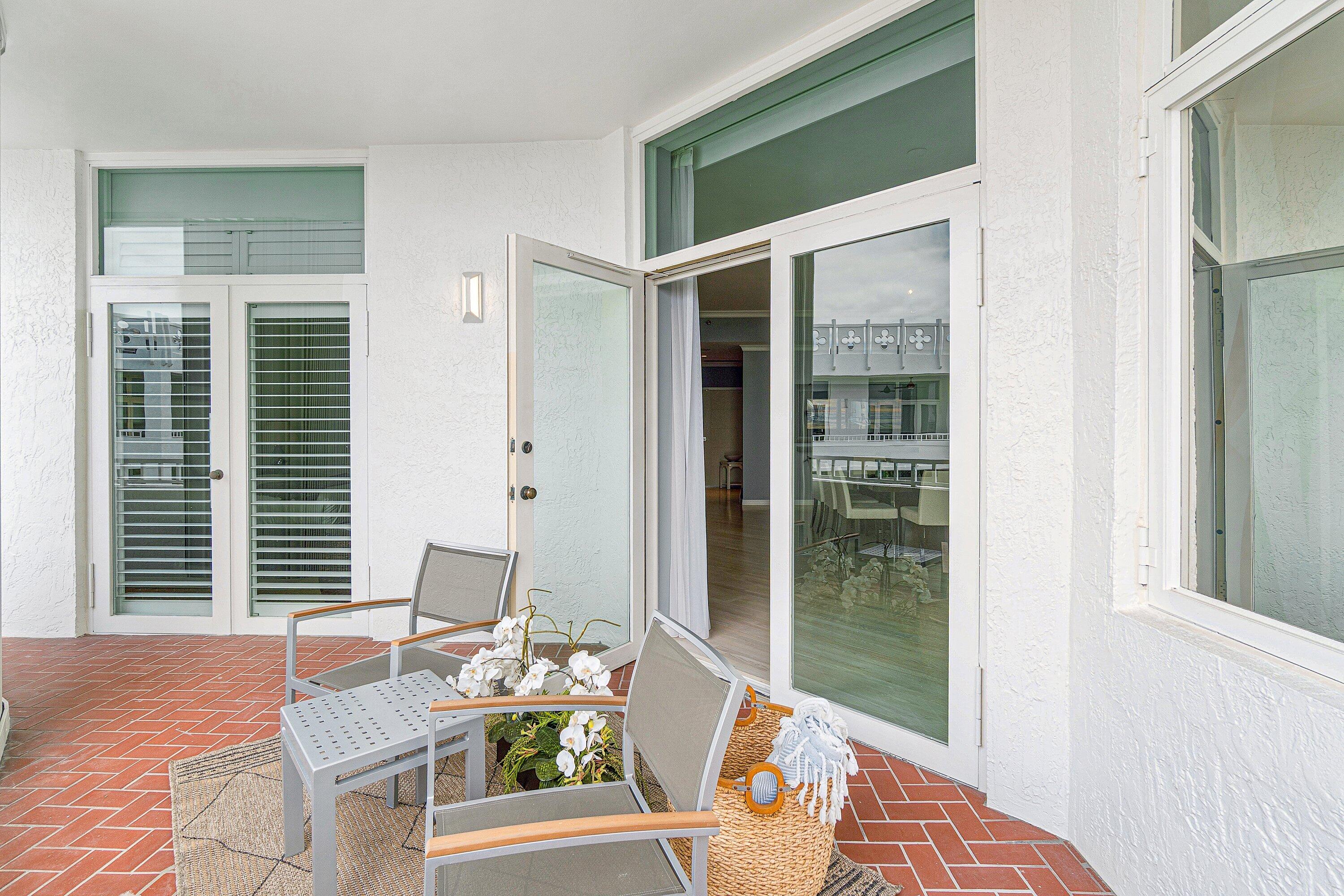 300 Southeast 5th Avenue, Unit PH 8120 Boca Raton, FL 33432 - Photo 34 of 54 a view of a balcony and dining area