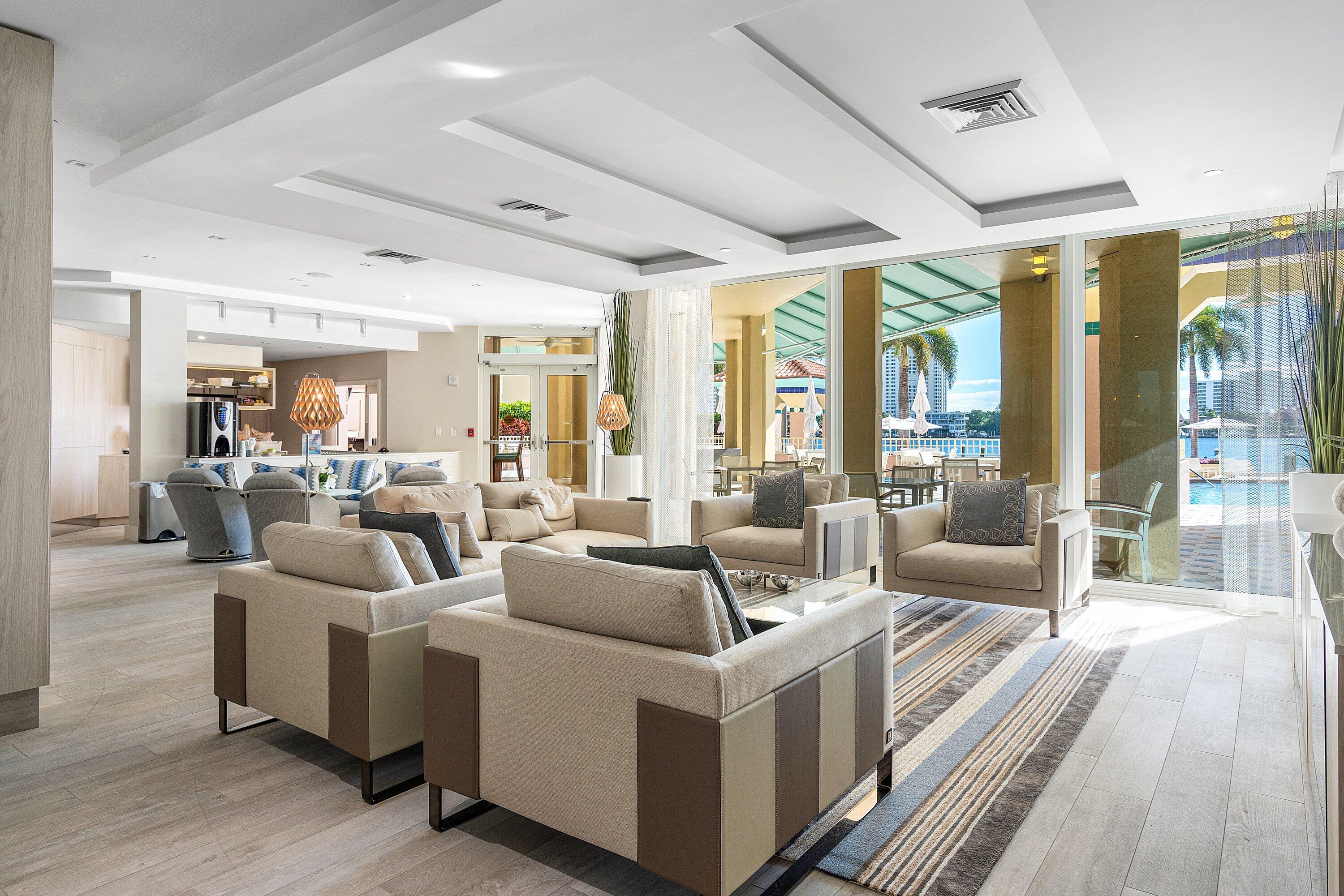 300 Southeast 5th Avenue, Unit PH 8120 Boca Raton, FL 33432 - Photo 39 of 54 a living room with furniture and a large window