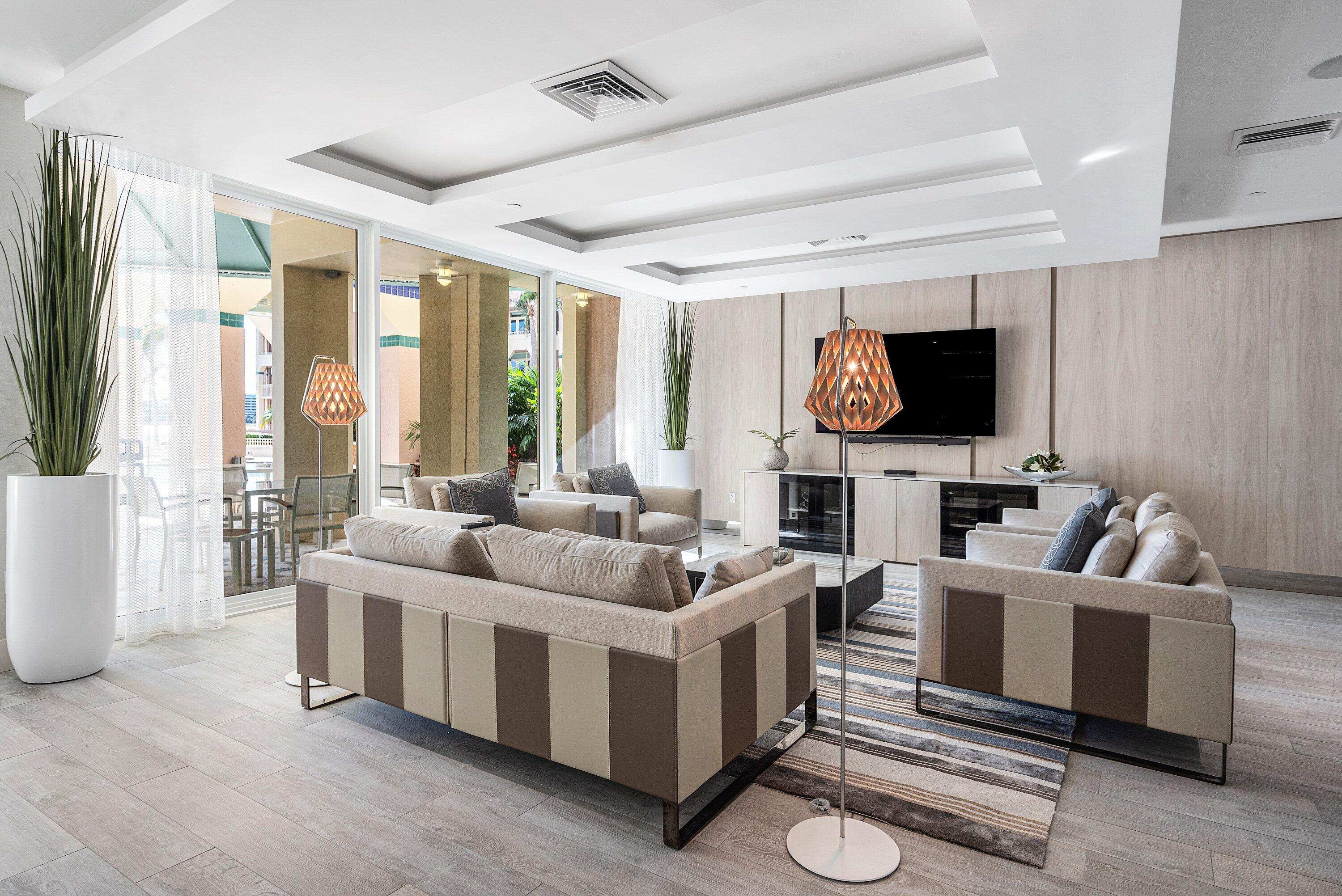 300 Southeast 5th Avenue, Unit PH 8120 Boca Raton, FL 33432 - Photo 40 of 54 a living room with furniture and a flat screen tv