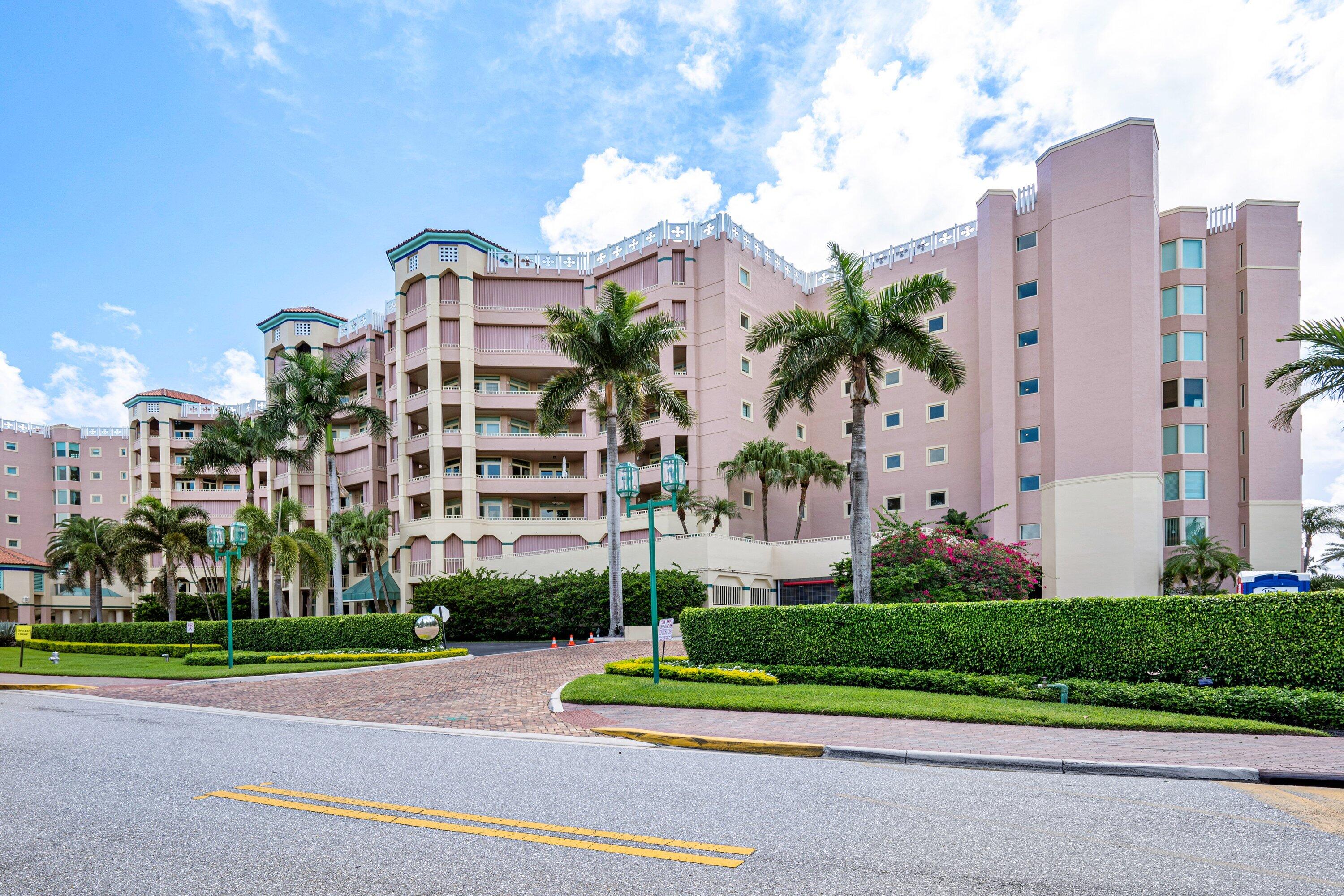 300 Southeast 5th Avenue, Unit PH 8120 Boca Raton, FL 33432 - Photo 41 of 54 a view of a tall building next to a yard