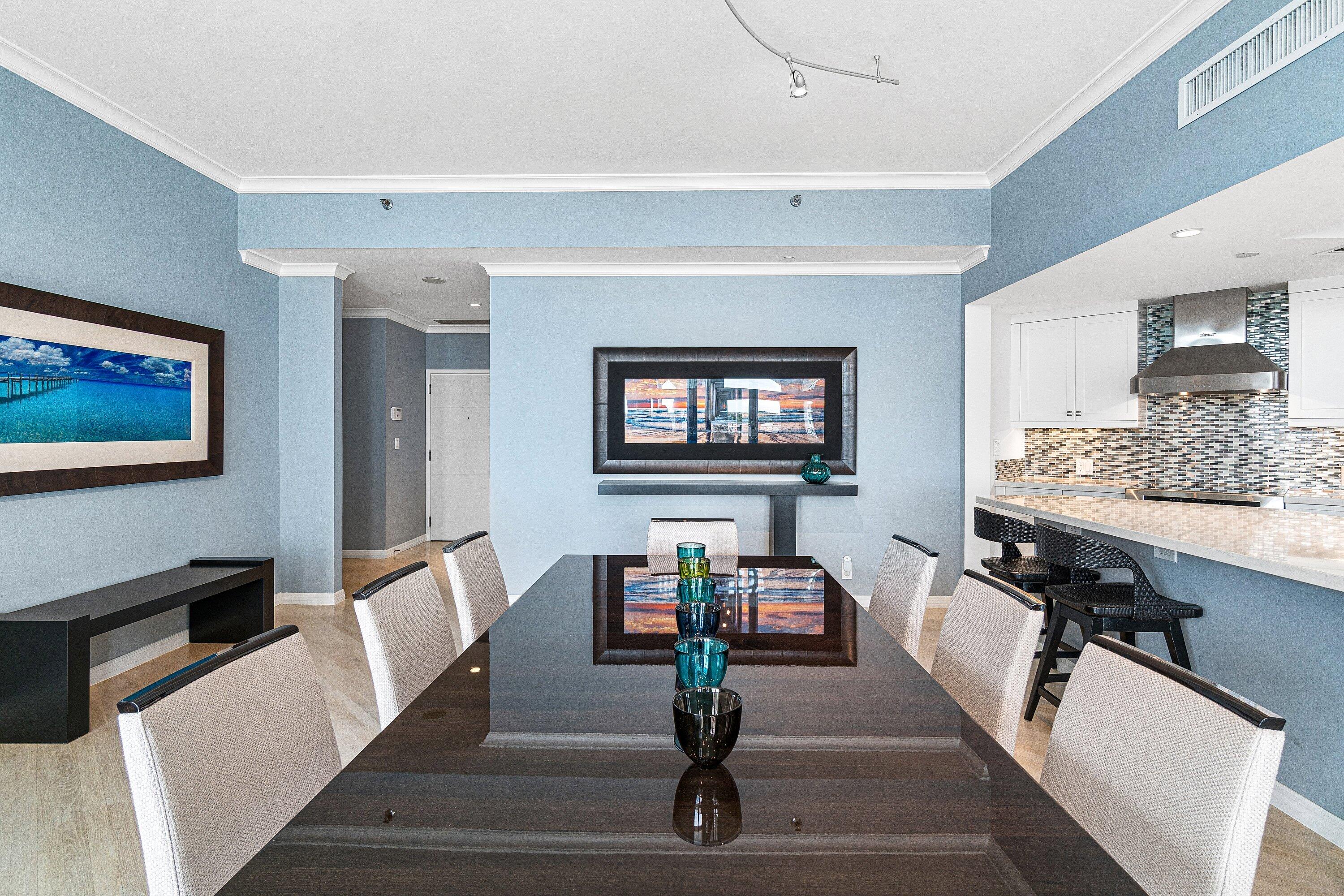 300 Southeast 5th Avenue, Unit PH 8120 Boca Raton, FL 33432 - Photo 7 of 54 a living room with furniture and a flat screen tv