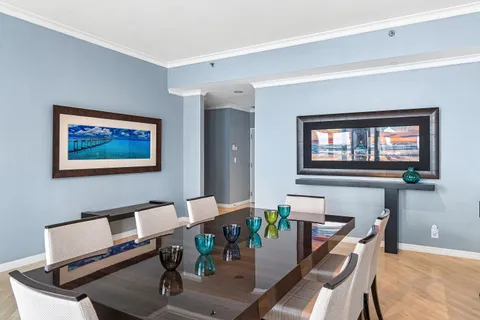 a workspace with furniture and a flat screen tv