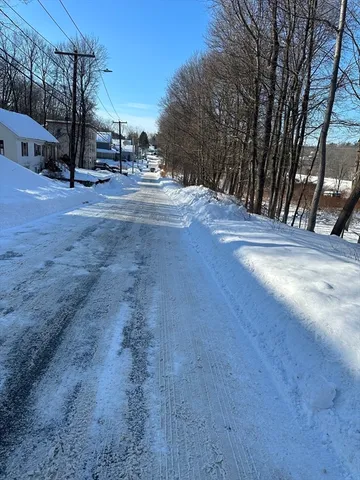 a view of road with trees