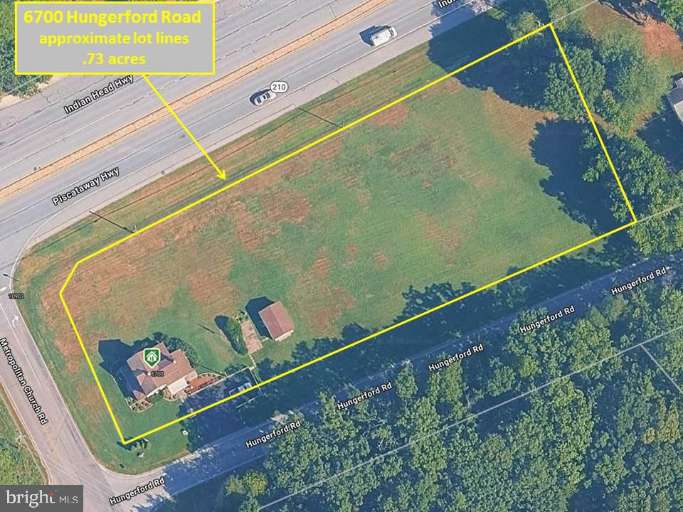 6700 Hungerford Road Bryans Road, MD 20616 - Photo 2 of 36 an aerial view of a tennis court