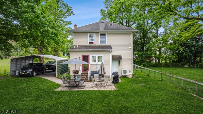 886 Brass Castle Road Belvidere, NJ 07823 - Photo 37 of 44 a view of a house with a yard and sitting area