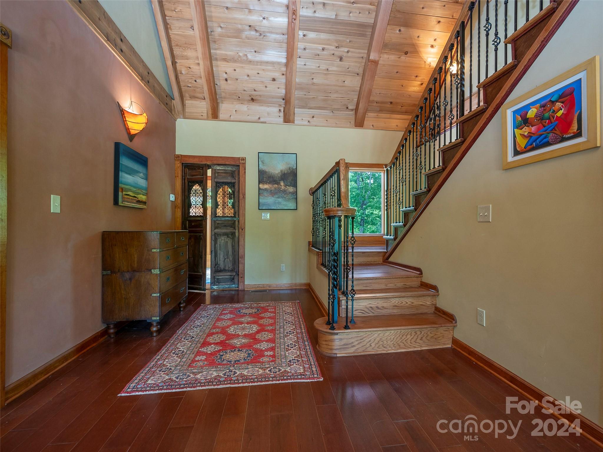 58 Next To The Last Road Saluda, NC 28773 - Photo 15 of 48 a view of entryway and hall with wooden floor