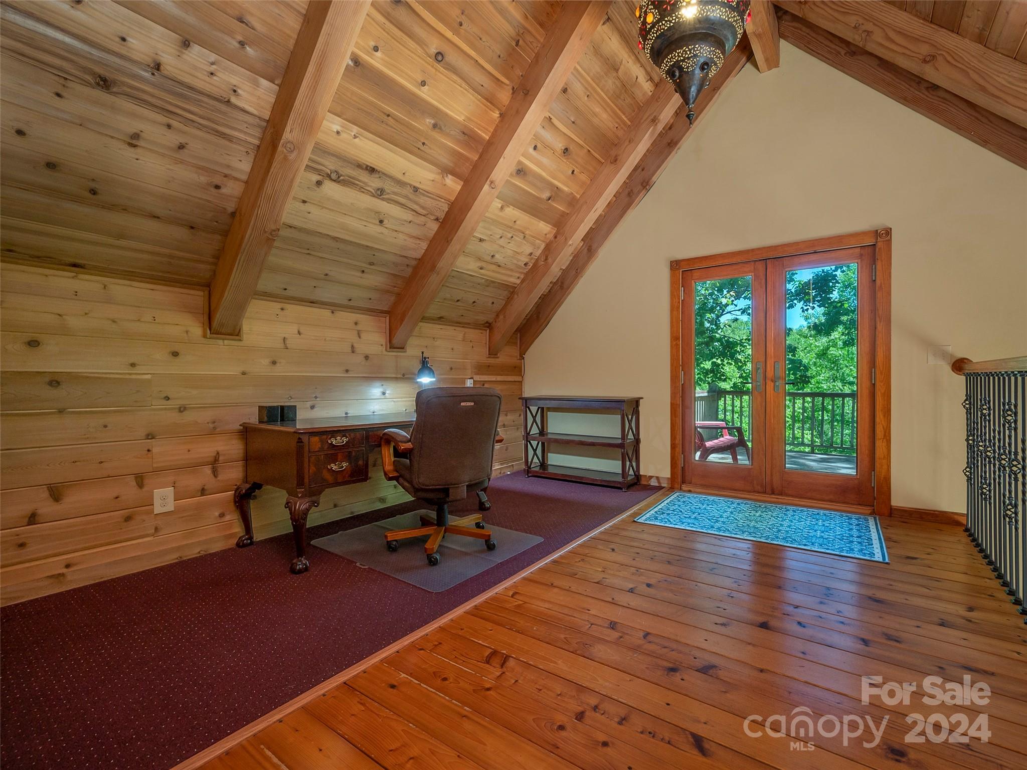 58 Next To The Last Road Saluda, NC 28773 - Photo 17 of 48 a living room with furniture floor to ceiling window and wooden floor