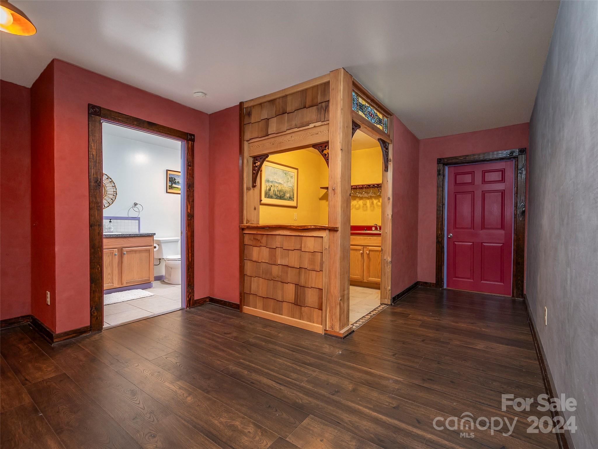 58 Next To The Last Road Saluda, NC 28773 - Photo 33 of 48 an empty room with wooden floor closet and windows