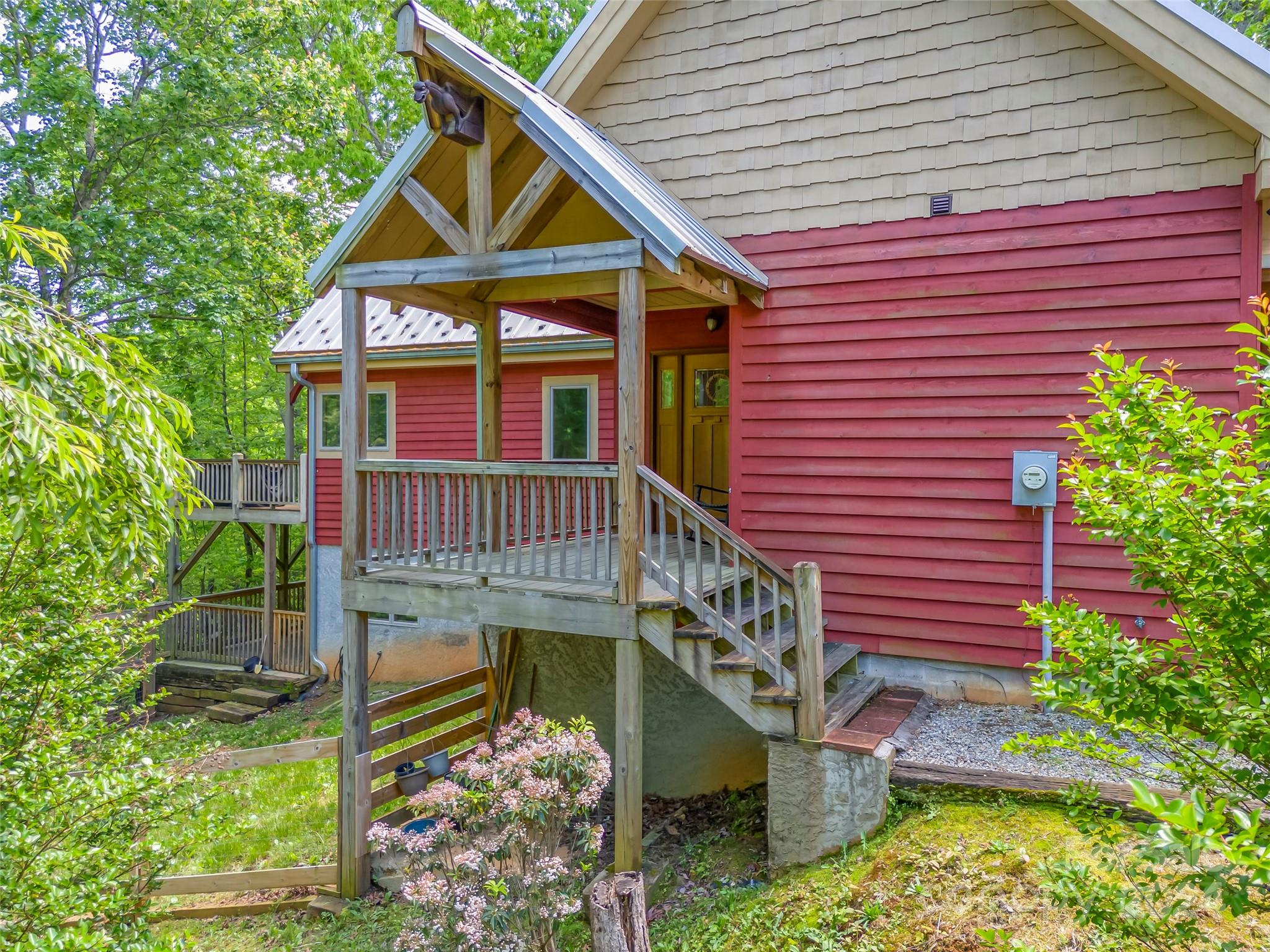 58 Next To The Last Road Saluda, NC 28773 - Photo 45 of 48 a front view of a house with balcony
