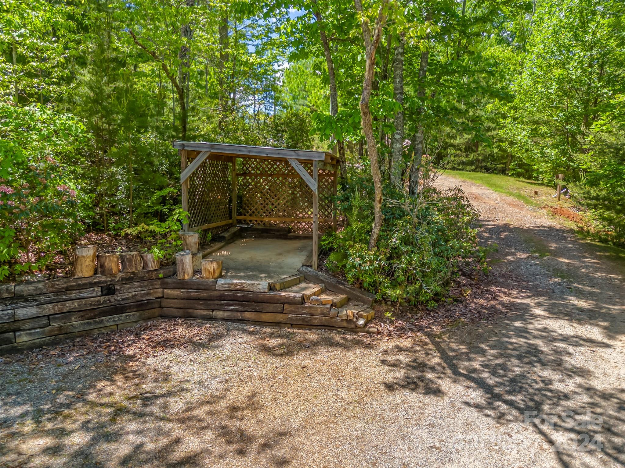 58 Next To The Last Road Saluda, NC 28773 - Photo 46 of 48 a backyard of a house with lots of green space