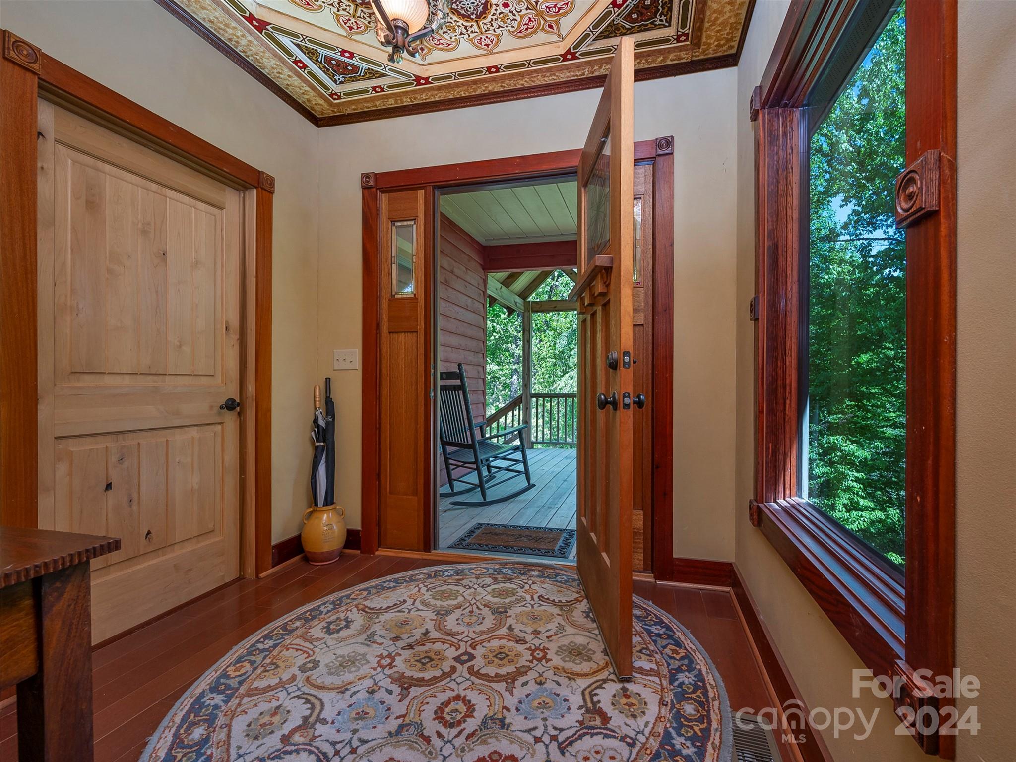 58 Next To The Last Road Saluda, NC 28773 - Photo 6 of 48 an entryway with a bed