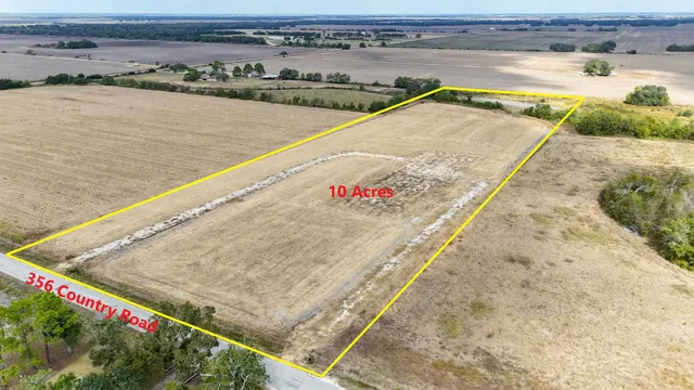 a view of swimming pool with outdoor seating