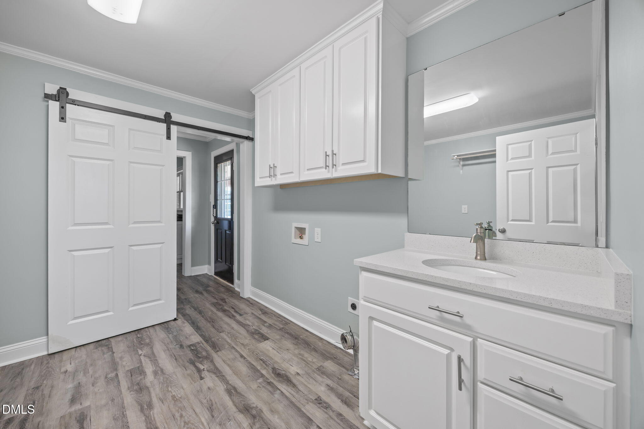 3611 Chewning Road Oxford, NC 27565 - Photo 44 of 45 a bathroom with a sink and a mirror