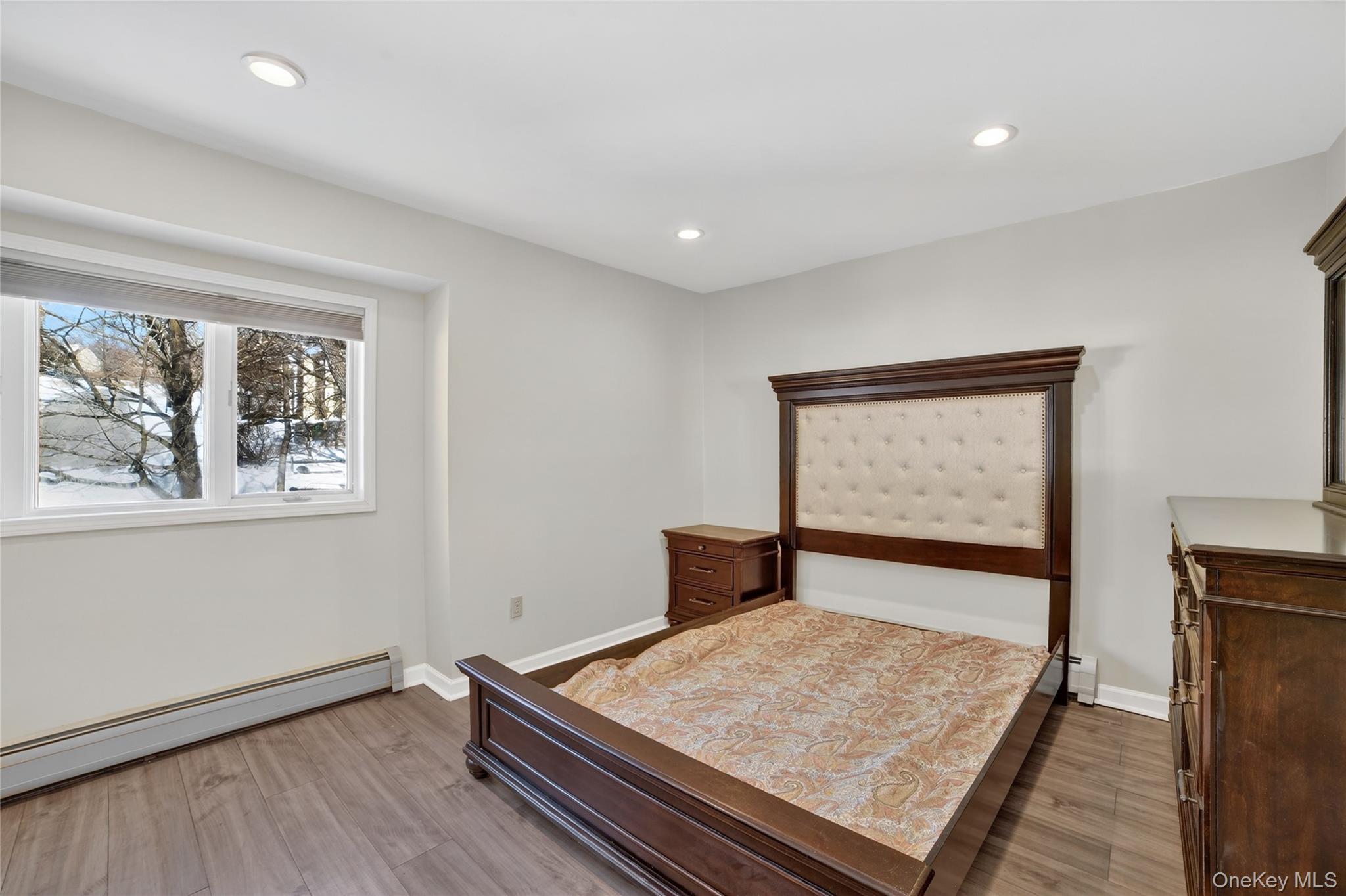 20 Beecher Lane Peekskill, NY 10566 - Photo 20 of 35 a bedroom with a bed and a window