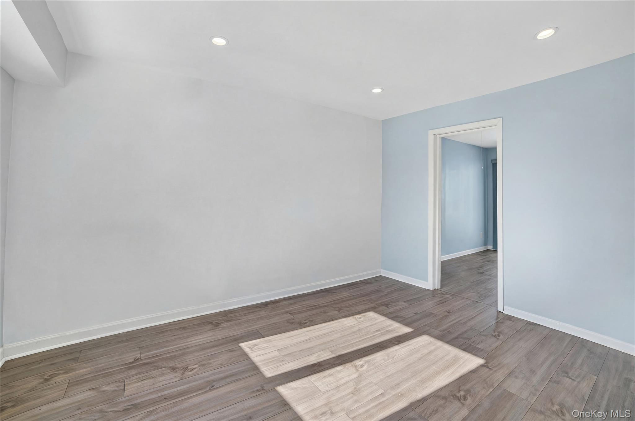 20 Beecher Lane Peekskill, NY 10566 - Photo 25 of 35 an empty room with wooden floor & cabinets