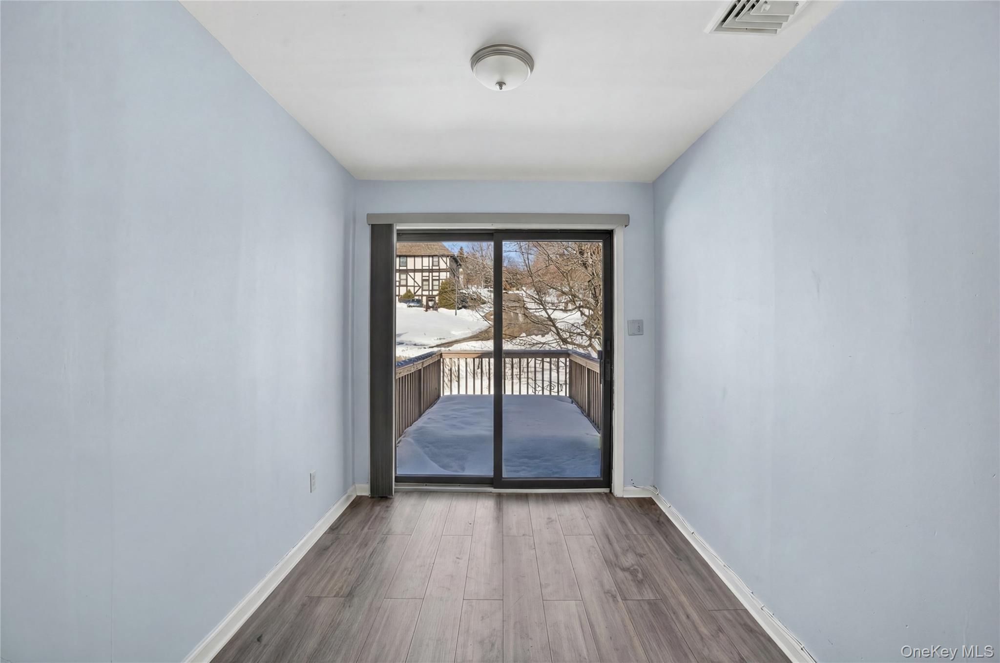 20 Beecher Lane Peekskill, NY 10566 - Photo 27 of 35 wooden floor in an empty room with a window