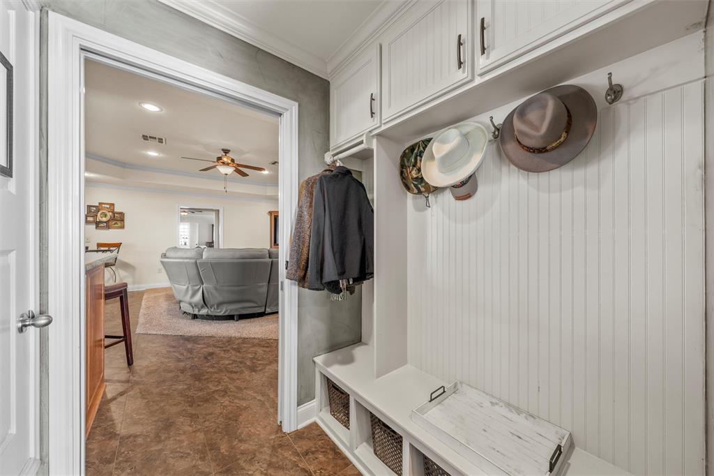 231 Trlica Road West, TX 76691 - Photo 11 of 36 a bathroom with a sink a mirror and shower