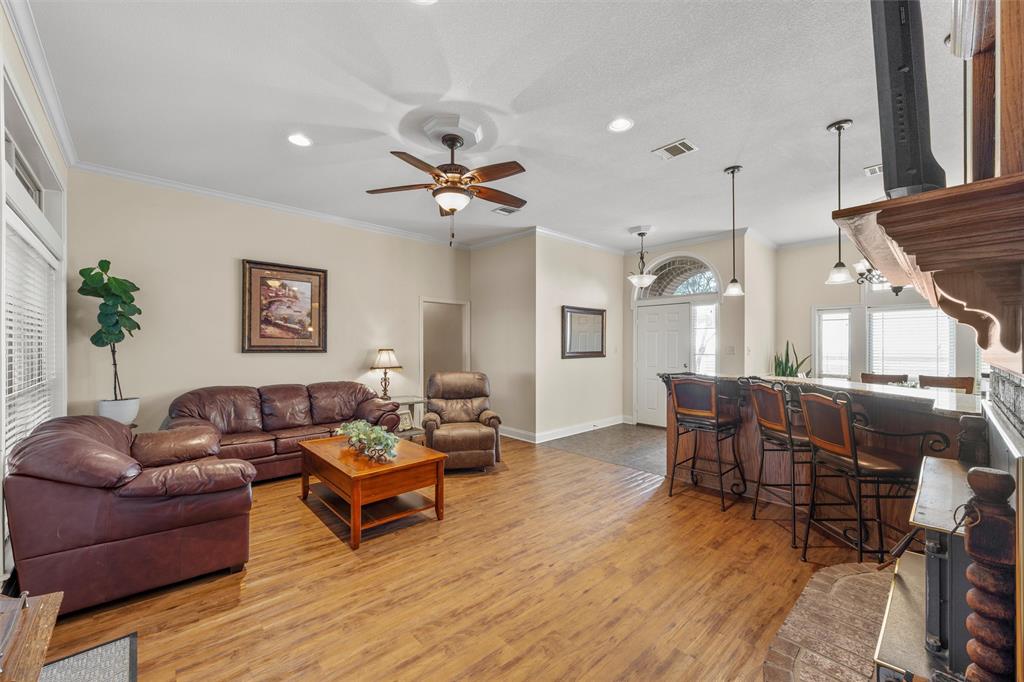 231 Trlica Road West, TX 76691 - Photo 5 of 36 a living room with furniture and wooden floor
