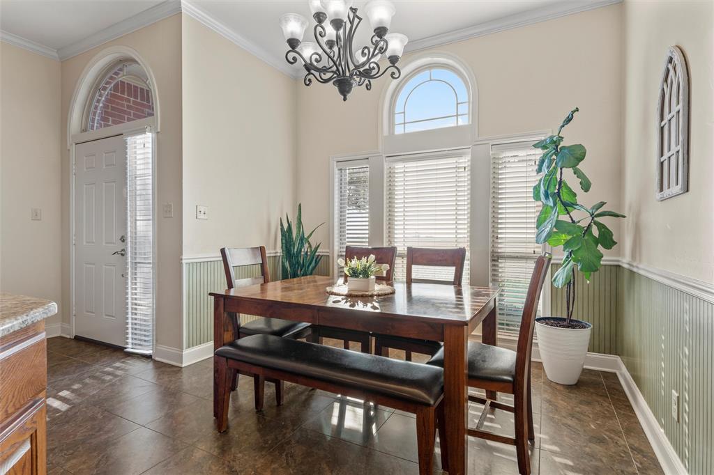 231 Trlica Road West, TX 76691 - Photo 6 of 36 a view of a dining room with furniture window and wooden floor