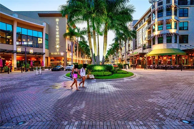 a view of a chairs and table in a patio