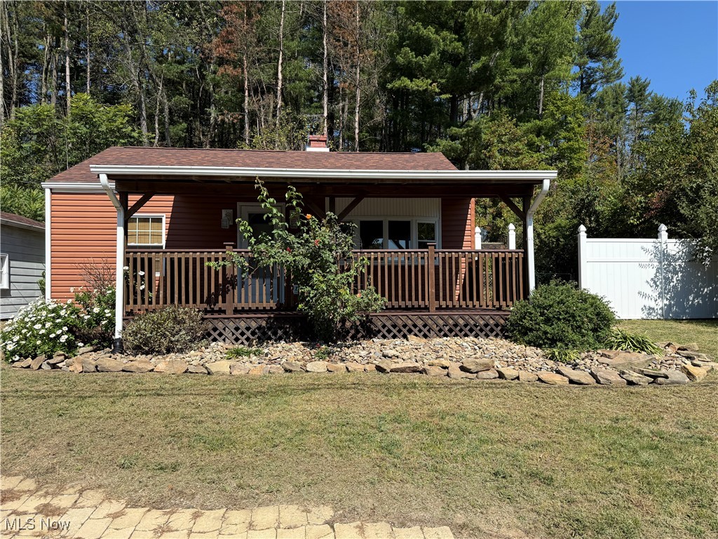 978 Center Road East Liverpool, OH 43920 - Photo 2 of 14 View of front of home featuring a chimney and covered porch