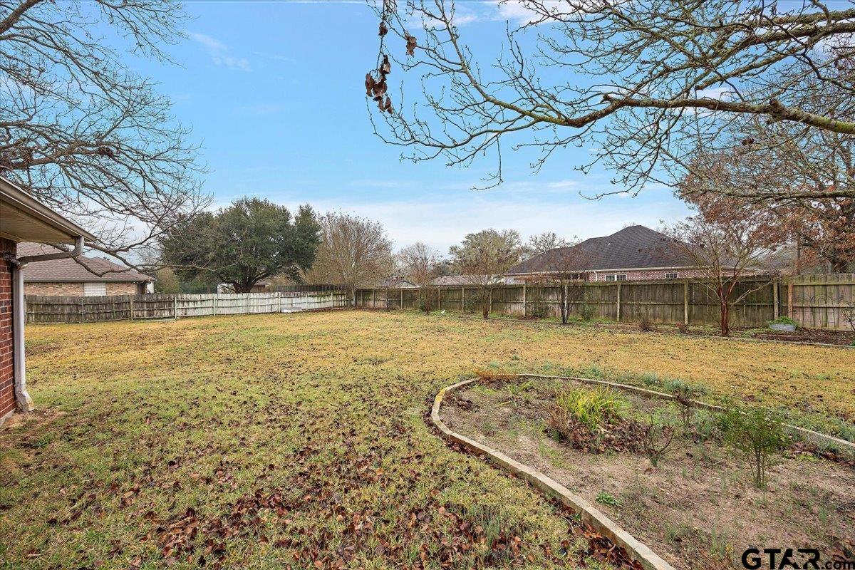 142 Parrish Rusk, TX 75785 - Photo 32 of 43 a view of a house with a yard