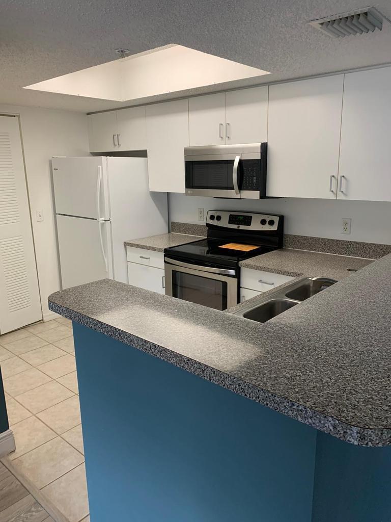5051 Wiles Road, Unit 305 Pompano Beach, FL 33073 - Photo 5 of 15 7BF9E8B0-DB52-4E89-AAA1-016F507003DA