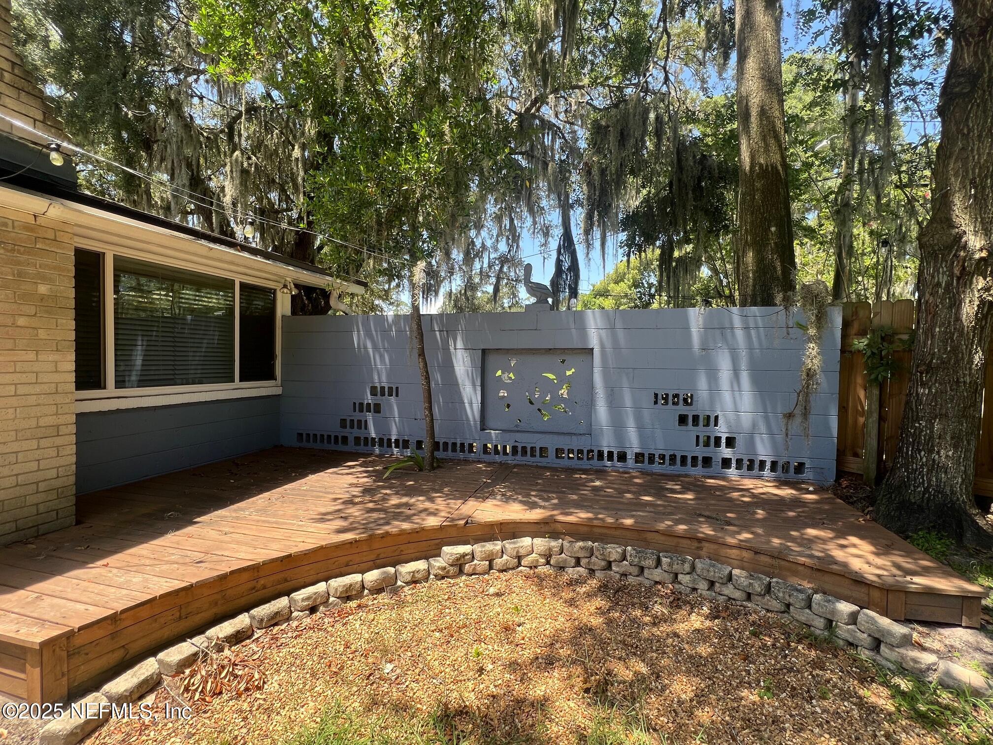 6231 Riviera Manor Drive Jacksonville, FL 32216 - Photo 3 of 15 a view of a house with a yard