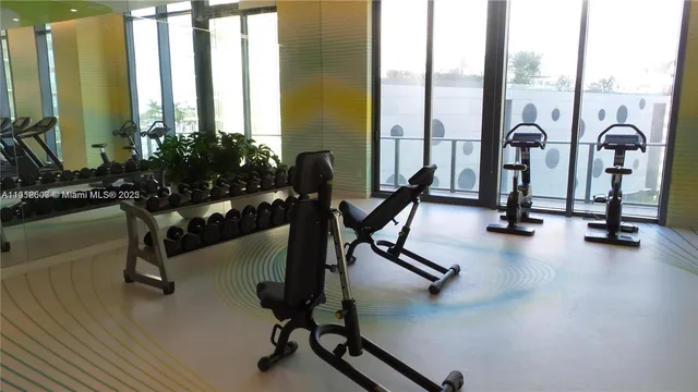 a view of a room with gym equipment