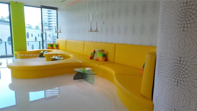 a bathroom with a tub and window