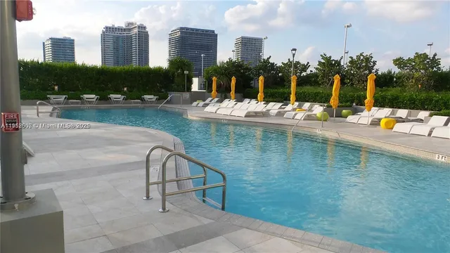 a view of water with tall building