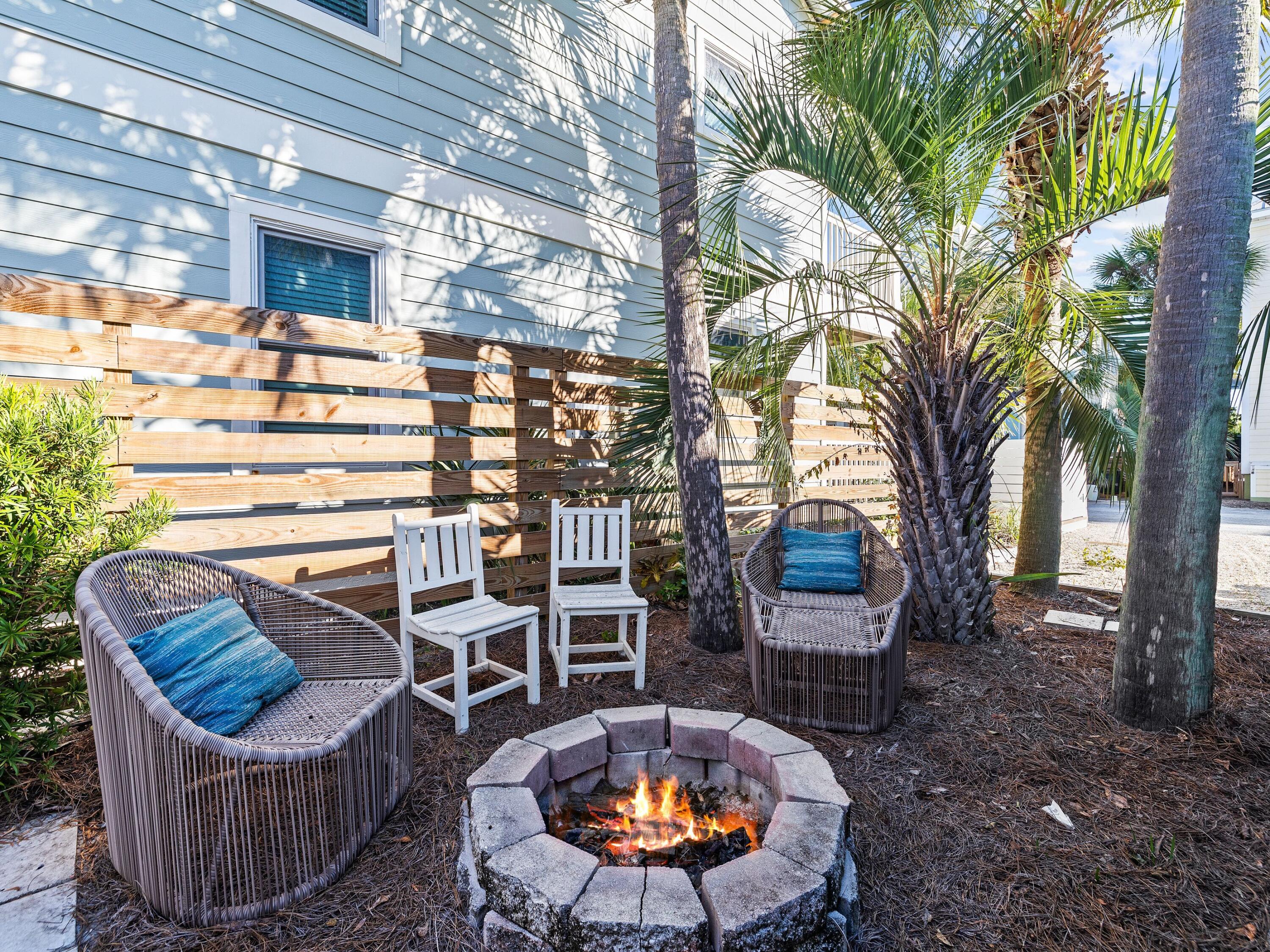 50 Cottage Street Santa Rosa Beach, FL 32459 - Photo 17 of 54 a view of a chairs and table in the patio