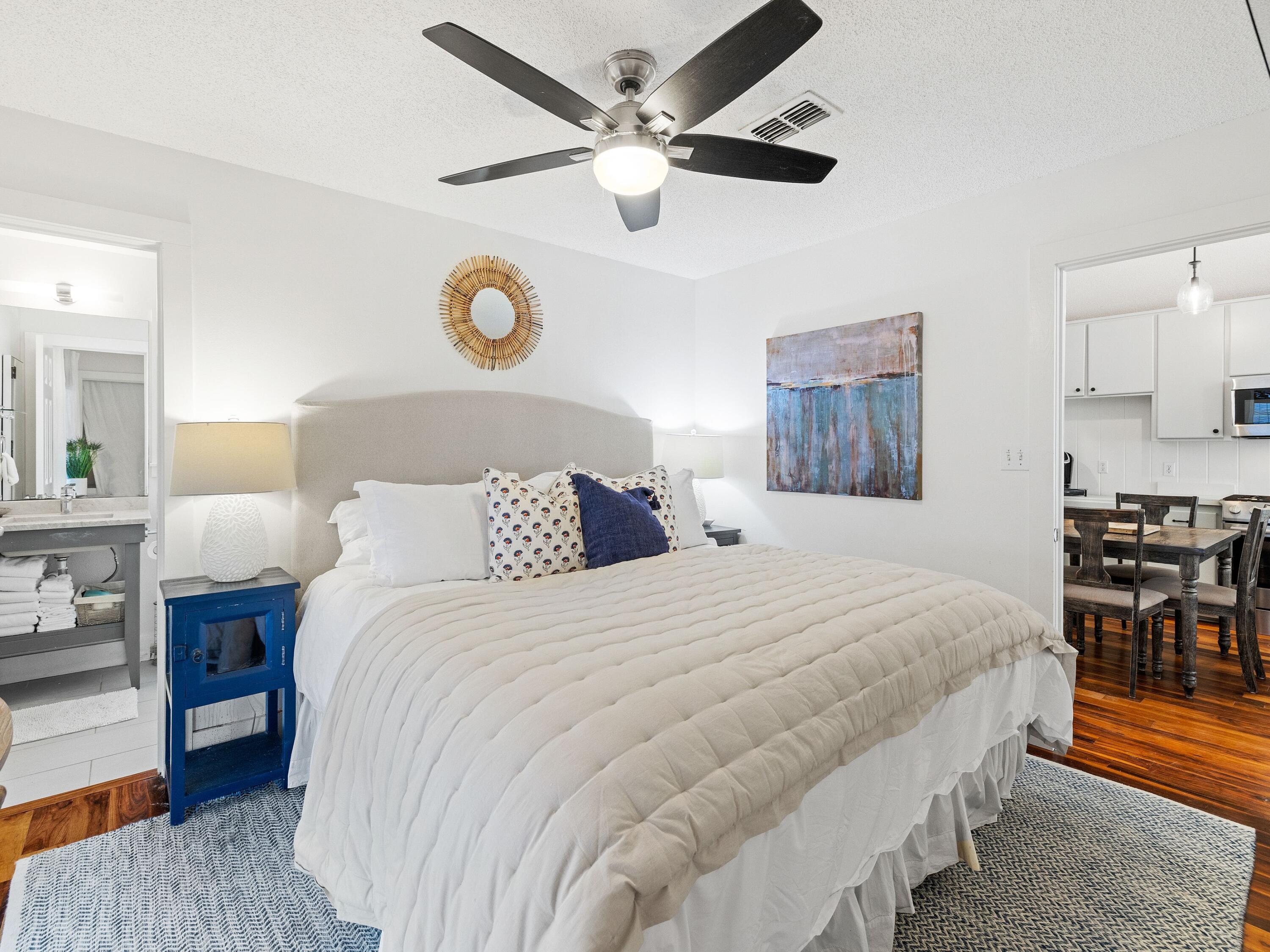 50 Cottage Street Santa Rosa Beach, FL 32459 - Photo 36 of 54 a bedroom with bed and a table