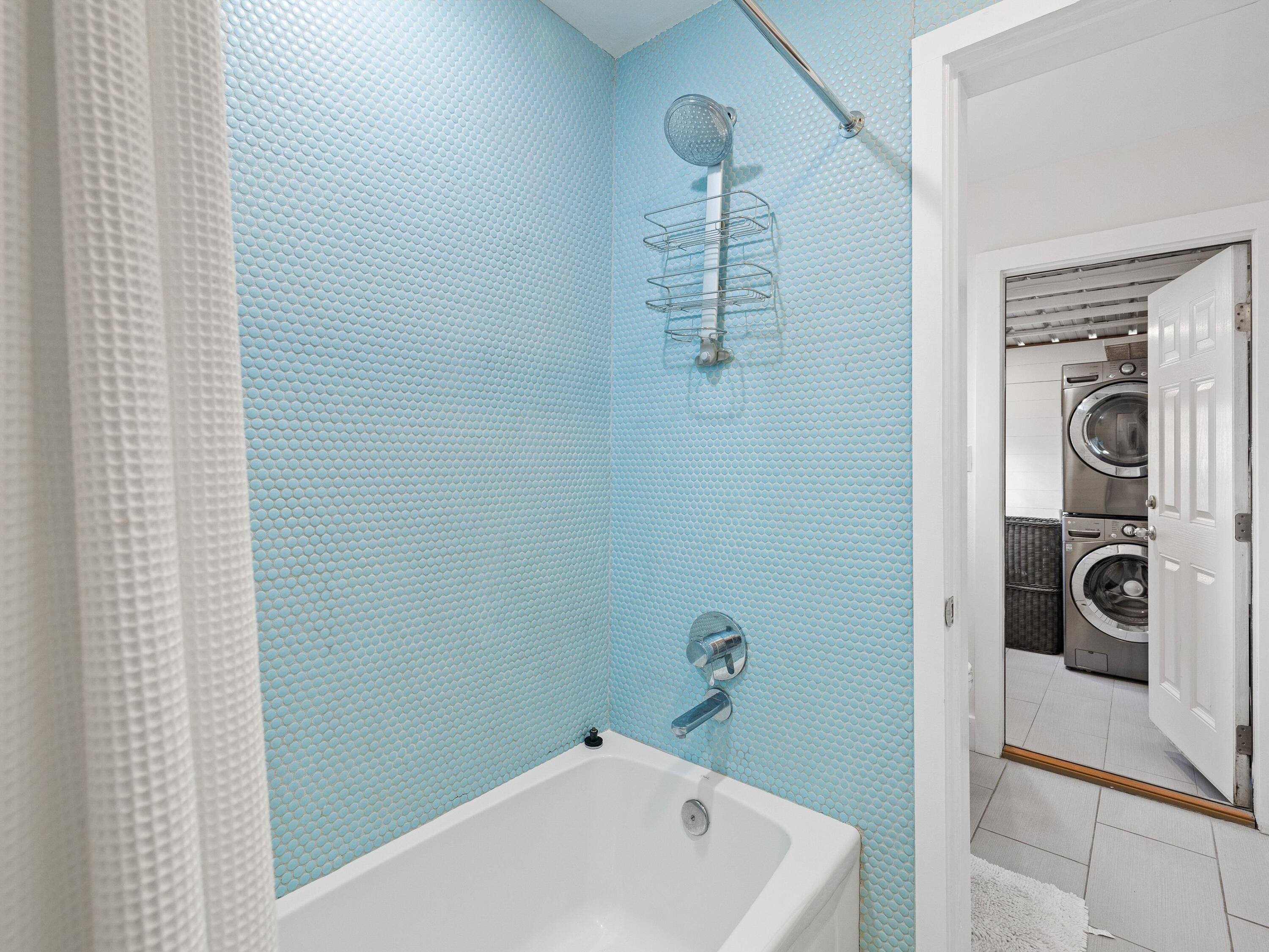 50 Cottage Street Santa Rosa Beach, FL 32459 - Photo 40 of 54 a bathroom with a bathtub and a shower