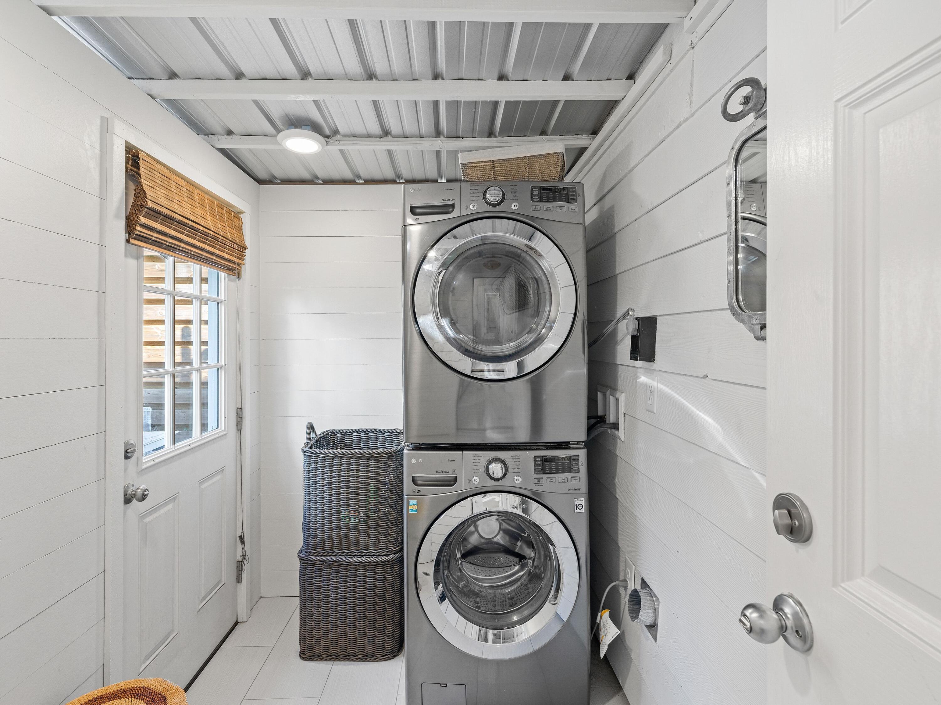 50 Cottage Street Santa Rosa Beach, FL 32459 - Photo 43 of 54 a utility room with dryer and washer