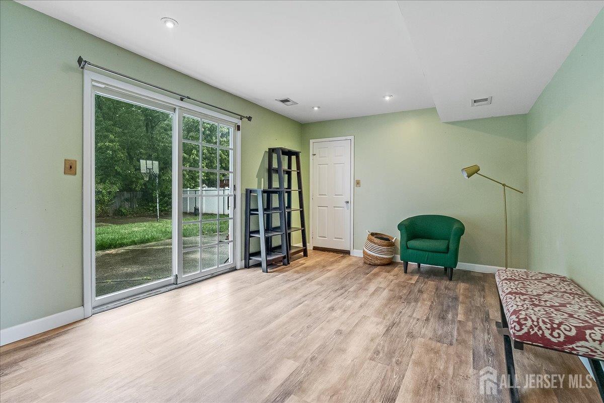 59 Appleman Road Somerset, NJ 08873 - Photo 3 of 18 a view of a livingroom with furniture wooden floor and a window