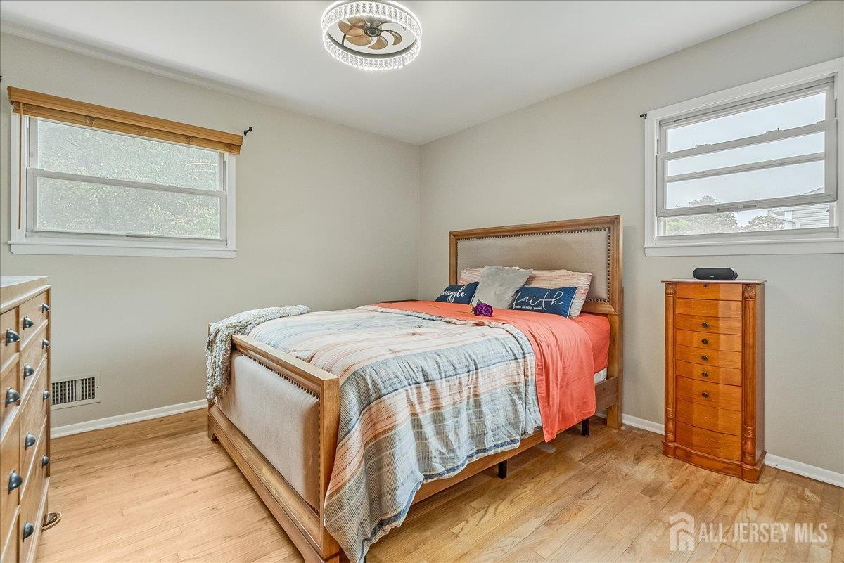 59 Appleman Road Somerset, NJ 08873 - Photo 10 of 18 a bedroom with a bed and a window