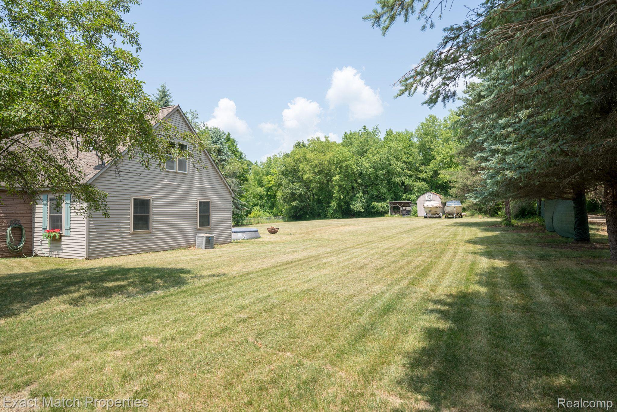3916 Gregory Road Lake Orion, MI 48359 - Photo 32 of 36 Side lot of the Property...