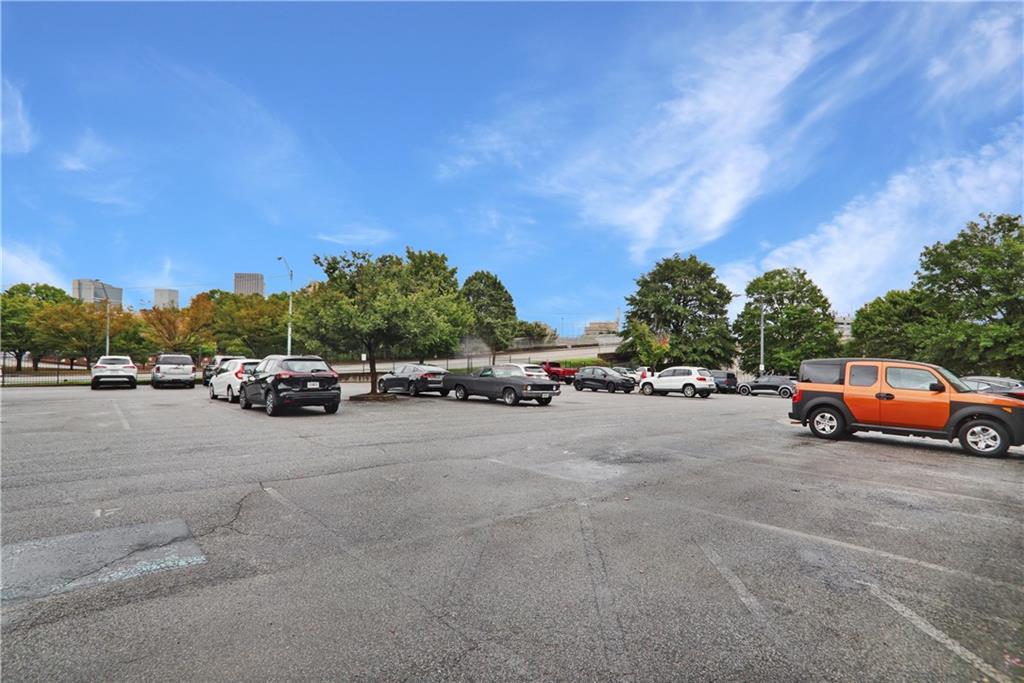 502 Pryor Street Southwest, Unit 113 Atlanta, GA 30312 - Photo 18 of 21 a car parked on the side of a street