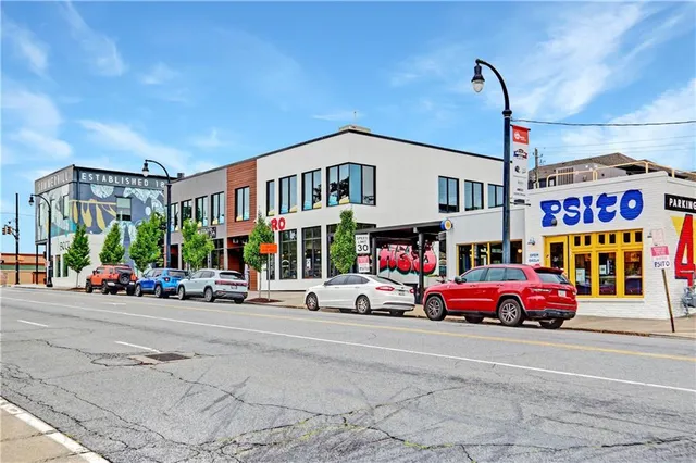 a car parked in front of a building