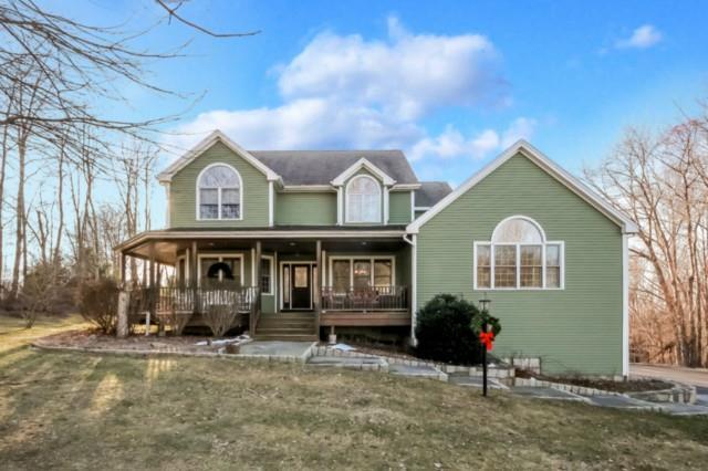 22 Cobblers Mill Road Newtown, CT 06482 - Photo 1 of 1 a front view of a house with yard