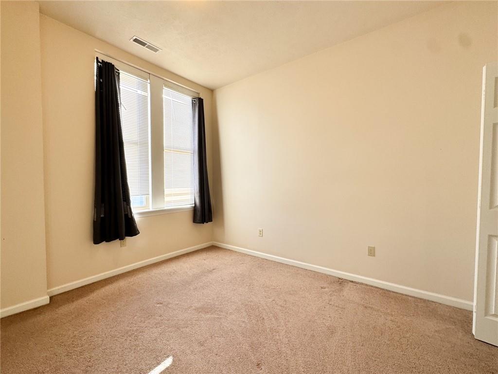 137 North Main Street, Unit D Butler, PA 16001 - Photo 7 of 12 a view of an empty room and window
