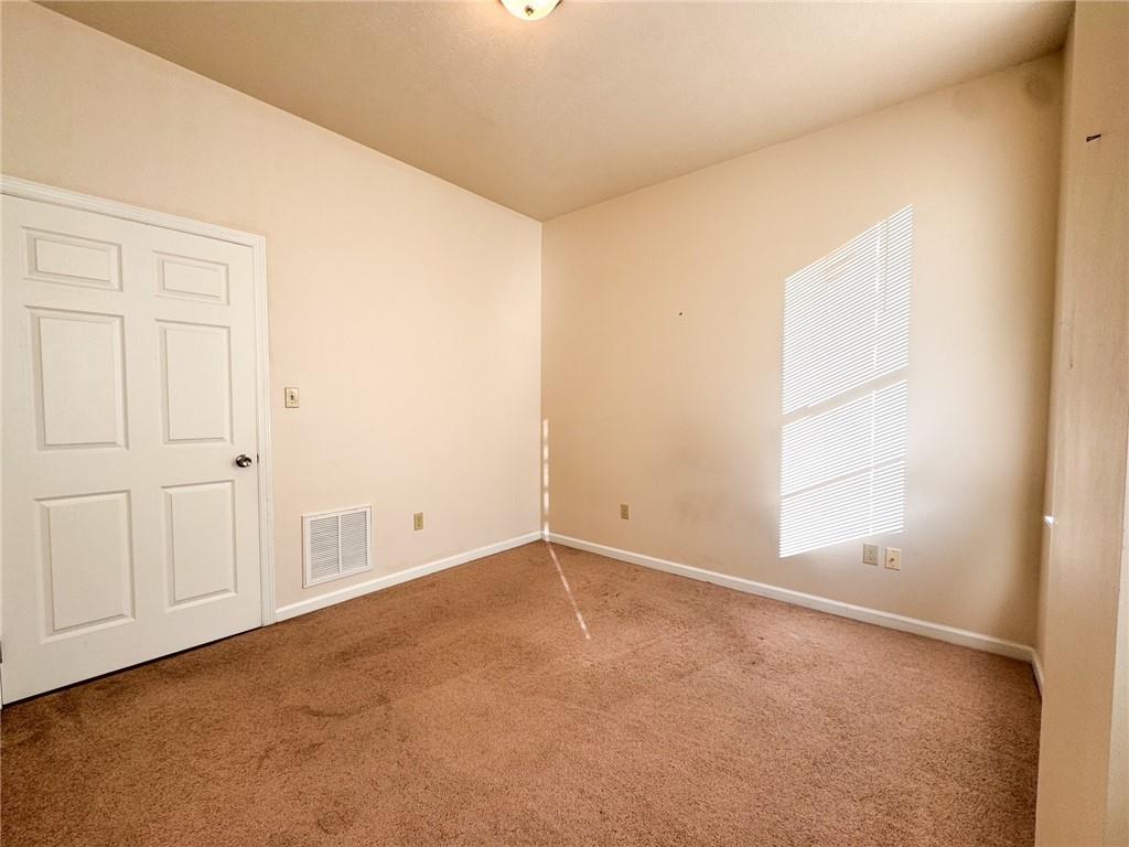 137 North Main Street, Unit D Butler, PA 16001 - Photo 8 of 12 an empty room with windows
