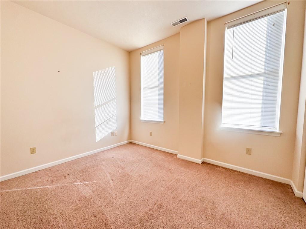 137 North Main Street, Unit D Butler, PA 16001 - Photo 10 of 12 an empty room with windows
