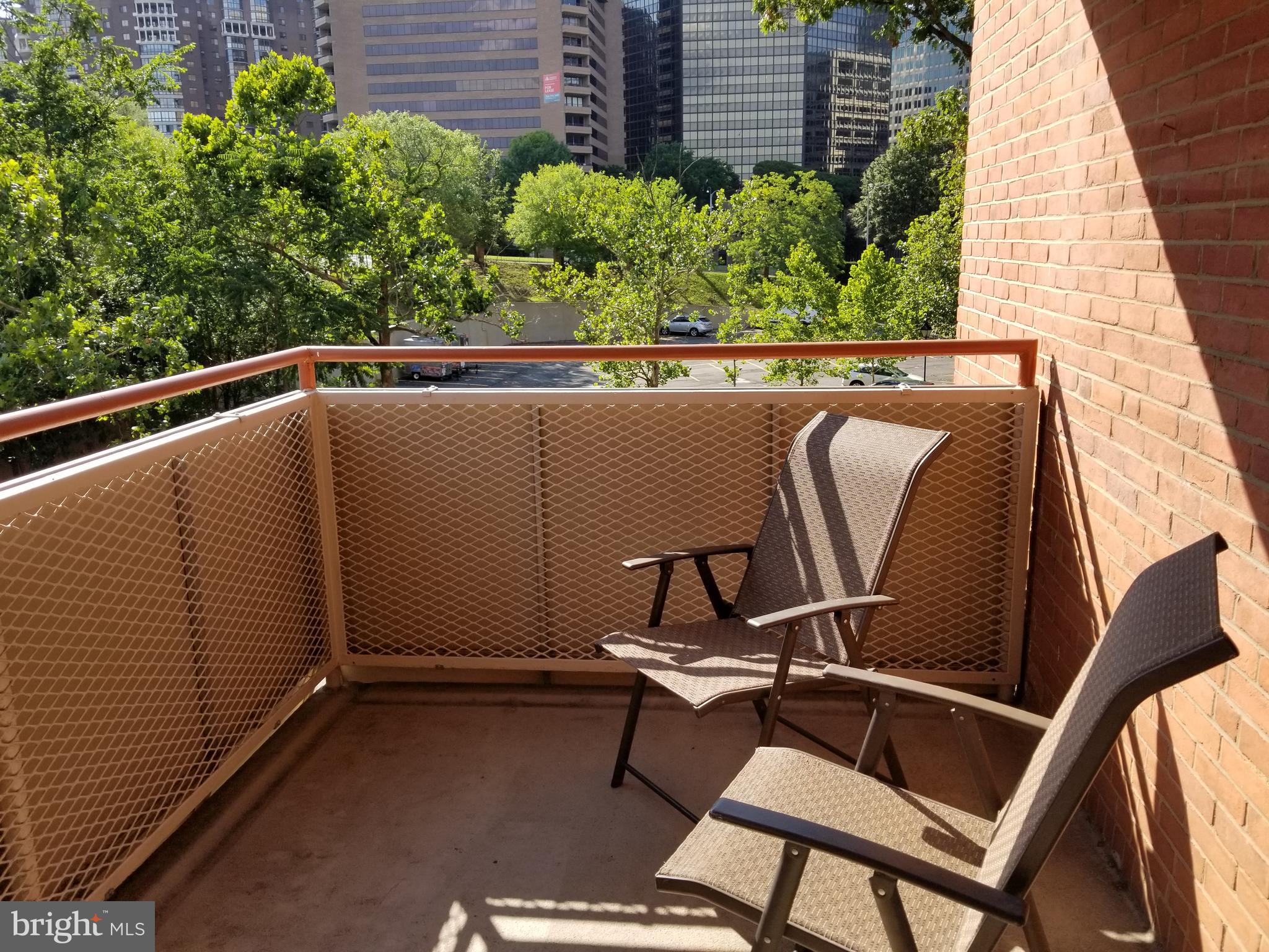 1111 Arlington Boulevard, Unit 307 Arlington, VA 22209 - Photo 23 of 36 a view of outdoor space with seating area