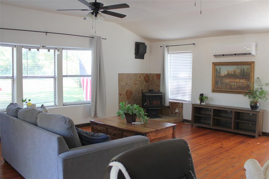 12608 Valverde Loop Terrell, TX 75161 - Photo 11 of 26 a living room with furniture and a window