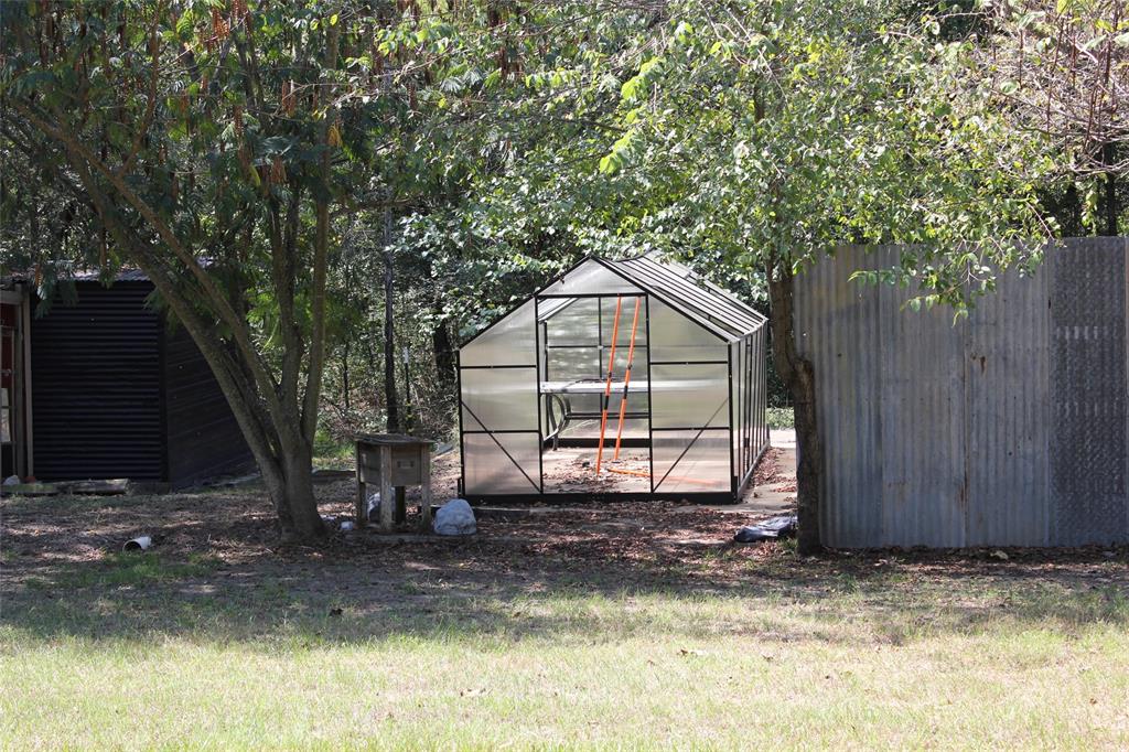 12608 Valverde Loop Terrell, TX 75161 - Photo 23 of 26 a view of a house with a yard